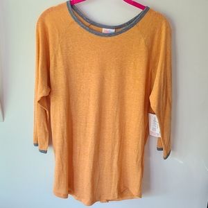 LuLaRoe 193,96 Randy T Light Orange 3/4 Sleeves